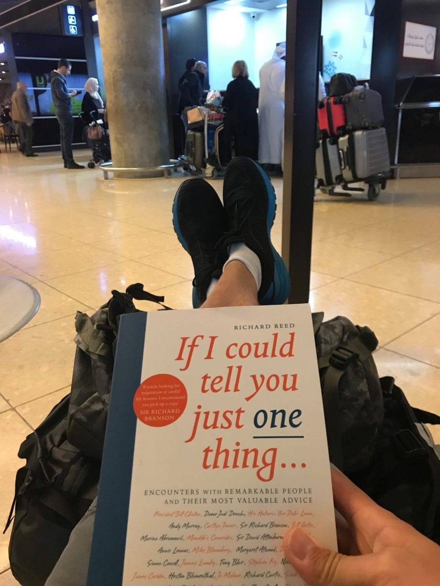 Waiting means reading while charging your phone at Amman airport